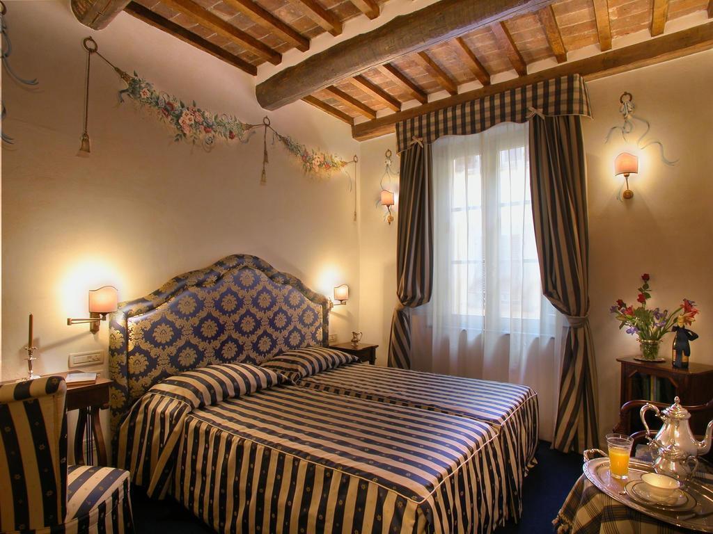 Hotel Relais Dell'Orologio Pisa Habitación foto